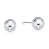 Pair of enewton silver stud earrings on a white background. Available at Be Charmed