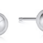 Pair of enewton silver stud earrings on a white background. Available at Be Charmed