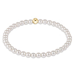 enewton 4 mm Pearl bracelet with a gold clasp on a white background. Available at Be Charmed
