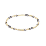 enewton Hope Unwritten Pearl Dark Grey 3mm Bracelet featuring gold-filled beads and dark grey pearls available at Be Charmed