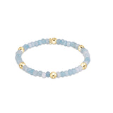 Aquamarine enewton presence gemstone 4mm bracelet featuring colorful gemstone beads and gold-filled accents available at Be Charmed