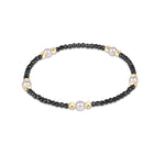Faceted Hematite enewton Purpose Pearl 4mm bracelet featuring gold-filled beads and freshwater pearls available at Be Charmed