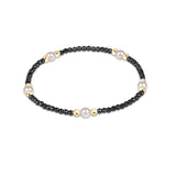 Faceted Hematite enewton Purpose Pearl 4mm bracelet featuring gold-filled beads and freshwater pearls available at Be Charmed
