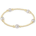enewton 6 mm Gold bracelet with pearls on a white background. Available at Be Charmed