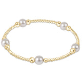 enewton 6 mm Gold bracelet with pearls on a white background. Available at Be Charmed