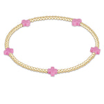 enewton - Bright Pink Signature Cross Small 2 mm Gold Bracelet available at Be Charmed