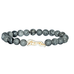 A beaded stretch Fahlo bracelet featuring dark gray and black marbled round beads with a small cheetah charm in the center, set against a plain white background. Available at Be Charmed