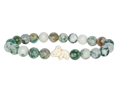 A beaded stretch Fahlo bracelet featuring round green and white marbled beads, separated by small white spacer beads, with a small white koala charm in the center, shown on a plain white background. Available at Be Charmed