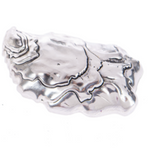 Back side of Ganz The World Is Your Oyster charm, polished metal oyster shell pocket token available at Be Charmed