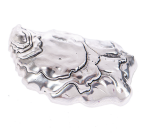 Back side of Ganz The World Is Your Oyster charm, polished metal oyster shell pocket token available at Be Charmed