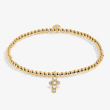 A Littles & Co A Little Blessing gold bracelet featuring a delicate gold charm on a beaded band, available at Be Charmed