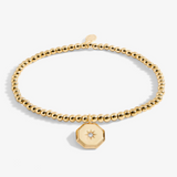 A Littles & Co First My Sister Forever My Friend gold bracelet featuring a delicate gold charm on a beaded band, available at Be Charmed