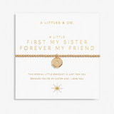 A gold chain bracelet with a central octagonal gold charm set with a clear crystal, displayed on a white card with gold lettering from the brand A LITTLES & CO. Available at Be charmed