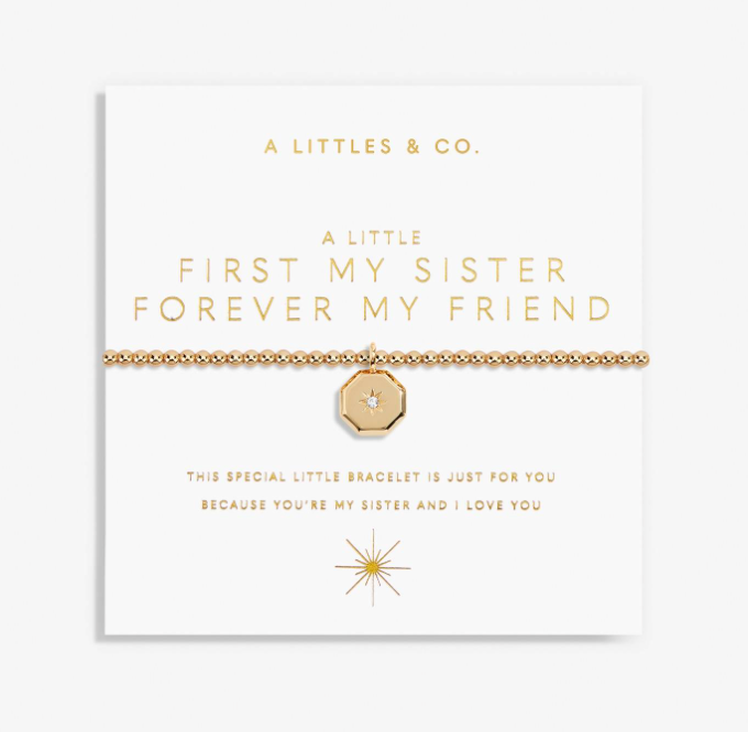 A gold chain bracelet with a central octagonal gold charm set with a clear crystal, displayed on a white card with gold lettering from the brand A LITTLES & CO. Available at Be charmed