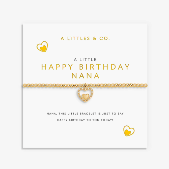 A gold heart-themed bracelet by A Littles & Co. displayed on its white gift card, which reads 'A LITTLE HAPPY BIRTHDAY NANA'. Available at Be Charmed