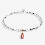 A Littles & Co Prosecco Ho Ho Ho silver and gold bracelet featuring a festive wine glass charm on a beaded band, available at Be Charmed
