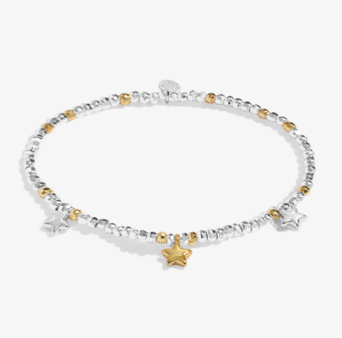 A Littles & Co Sparkle Confetti A Little Congratulations silver and gold bracelet featuring a mixed-metal charm on a delicate beaded band, available at Be Charmed