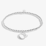 A Littles & Co You're Engaged silver bracelet featuring a delicate engagement ring charm on a beaded band, available at Be Charmed