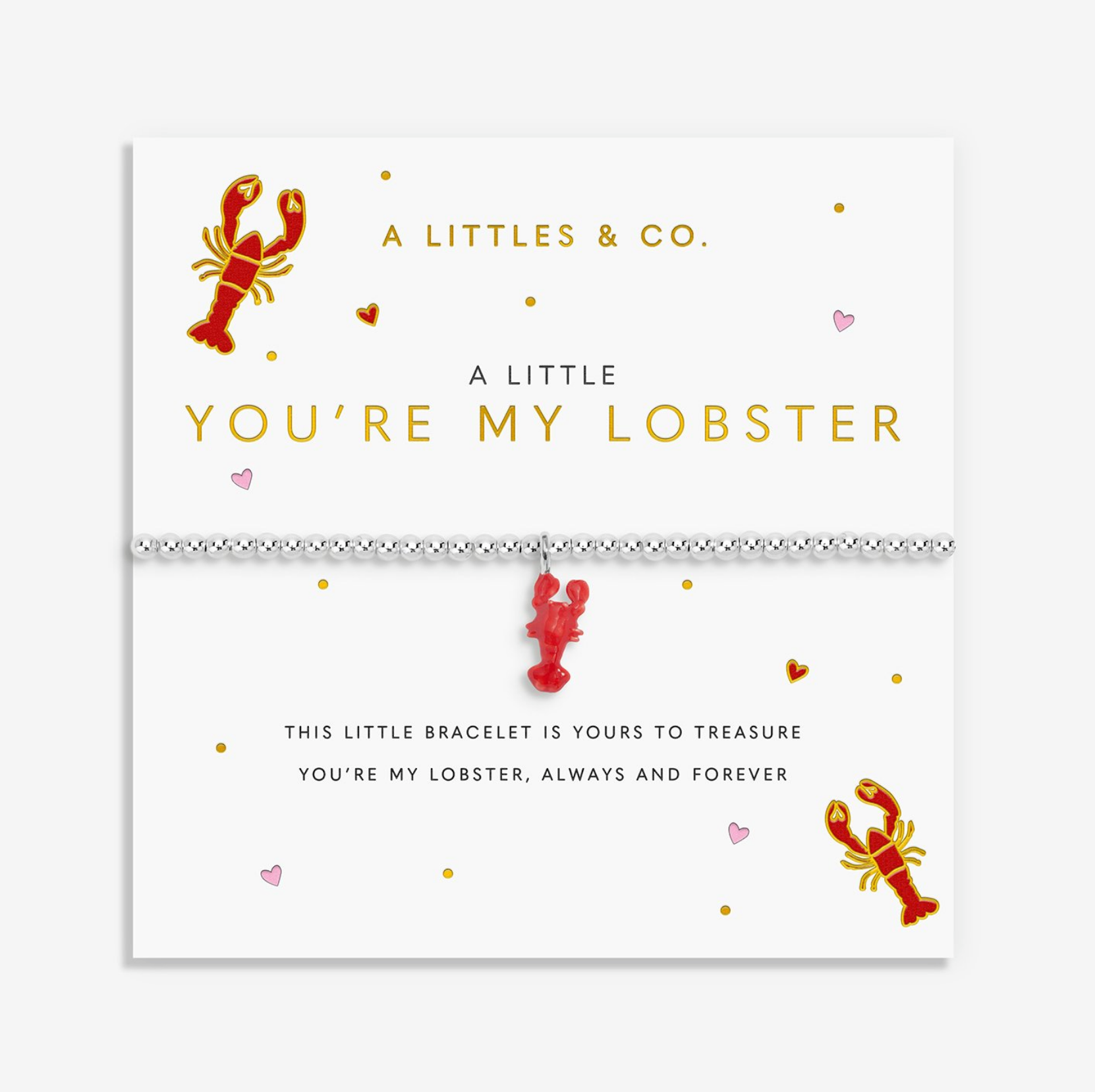 A silver-toned beaded bracelet with a red lobster charm, presented on a white card from A Littles & Co. The card reads 'A LITTLE YOU’RE MY LOBSTER' and includes matching lobster illustrations. Available at Be Charmed