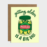 Brittany Paige birthday card featuring a pickle illustration and the text Getting Older is a Big Dill, available at Be Charmed