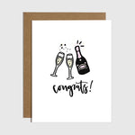 Brittany Paige champagne bottle greeting card featuring the text Congrats!, available at Be Charmed