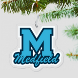 A blue and white acrylic laser cut ornament with the letter 'M' in the center, hanging from a Christmas tree with pine needles in the background. Available at Be Charmed