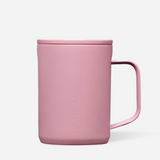 A desert rose ceramic mug with a matching lid and handle, featuring the embossed brand name Corkcicle on the front, set against a clean white background. Available at Be Charmed