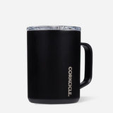 A matte black CorKicle insulated mug with a clear lid and a black handle, shown on a light gray background. Available at Be Charmed