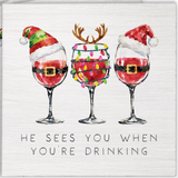 Rustic Marlin coaster featuring funny holiday text reading He Sees You When You're Drinking, available at Be Charmed