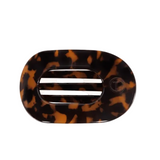 Small Teleties flat round clip in tortoise pattern featuring a sleek geometric design, available at Be Charmed