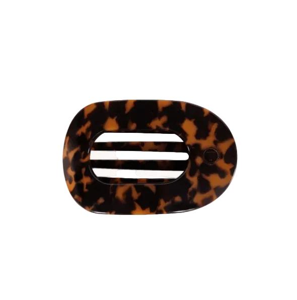 Tiny Teleties flat round clip in tortoise pattern featuring a sleek geometric design, available at Be Charmed