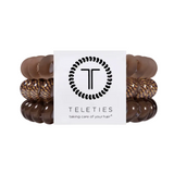Large eleties Morning Brew hair ties featuring a warm neutral spiral design, available at Be Charmed