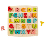 Hape chunky alphabet puzzle featuring colorful wooden letters available at Be Charmed
