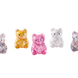 Hape glitter bear squish featuring a soft, sparkling sensory toy available at Be Charmed