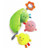 Hape Pea Pod Pals wooden toy featuring a green pea pod with removable smiling peas available at Be Charmed