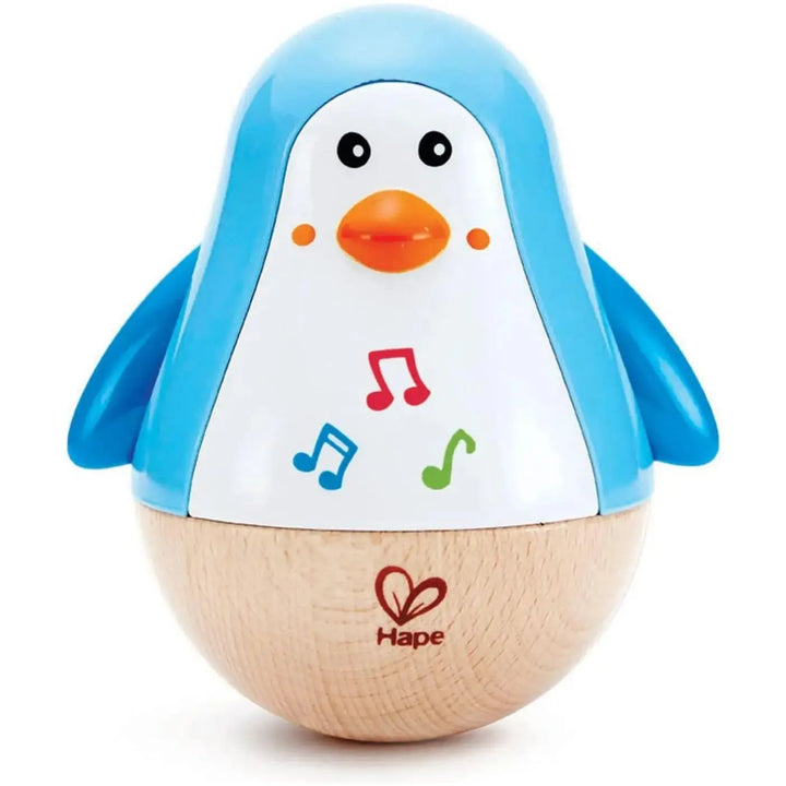 Hape penguin musical wobbler featuring a black and white penguin design with a gentle chime available at Be Charmed