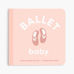 A baby picture book titled 'Ballet baby' by Danielle Wilson, featuring a soft pink cover with white text and a central illustration of ballet shoes. Available at Be Charmed