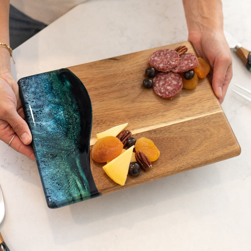 Northern Lights Lynn & Liana date night board featuring an eco-wood and resin serving platter available at Be Charmed