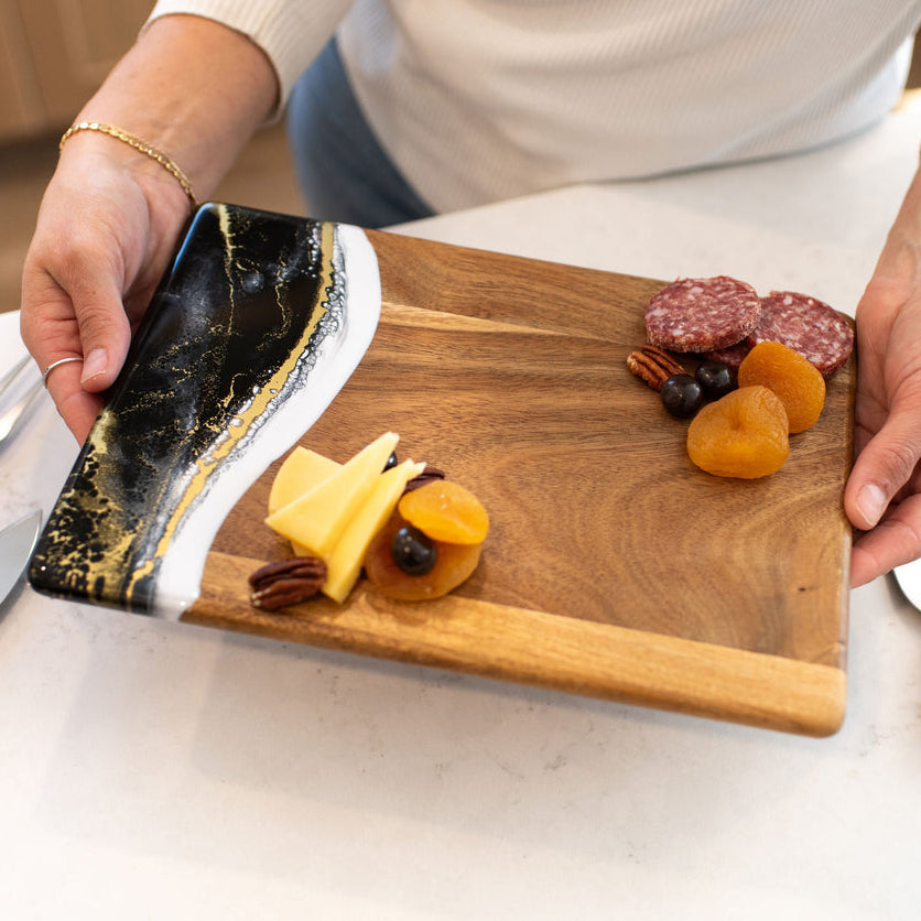 Onyx Lynn & Liana date night board featuring an eco-wood and resin serving platter available at Be Charmed