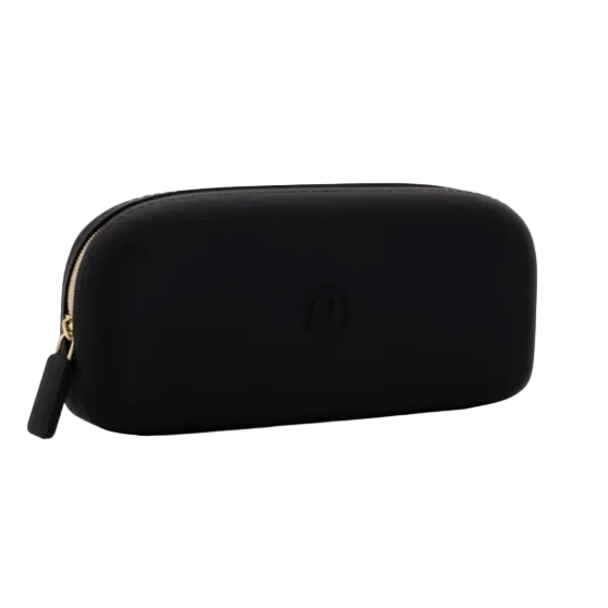 A black soft-shell zippered carrying case with a gold zipper pull and a subtle embossed logo on the front, shown against a plain white background. Availablea t Be Charmed