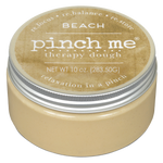 Jar of beach 'pinch me' therapy dough with a beige lid and body on a white background. Available at Be Charmed