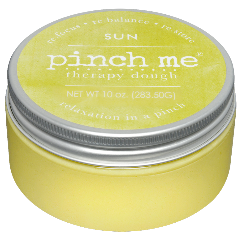 Yellow therapy dough jar with a silver lid on a white background. Available at Be Charmed