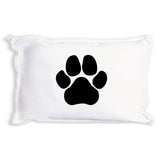 A Rustic Marlin white rectangular pillow with a black paw print graphic in the center, shown against a plain white background. Available at Be Charmed