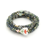 Scout Curated Wears Ceramic Bead Wrap in love/heart; featuring multi-strand ceramic and metallic bead wrap bracelet available at Be Charmed