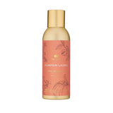 Thymes Pumpkin Laurel home fragrance mist bottle on a white background. Available at Be Charmed
