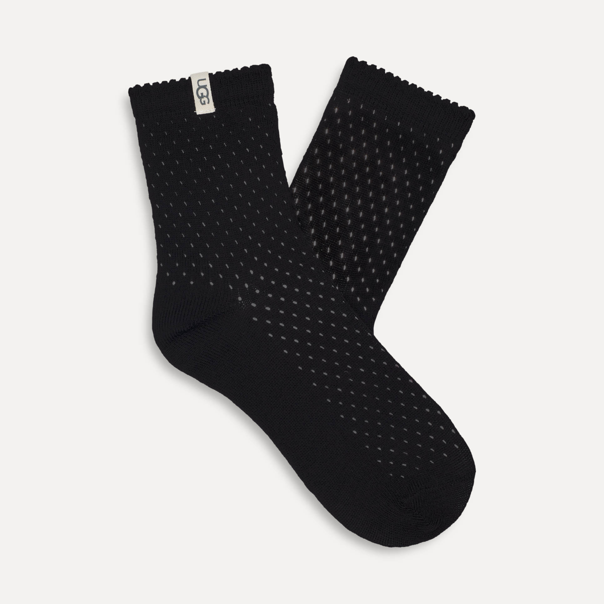 A pair of black quarter socks with a visible logo on the heel. Available at Be Charmed