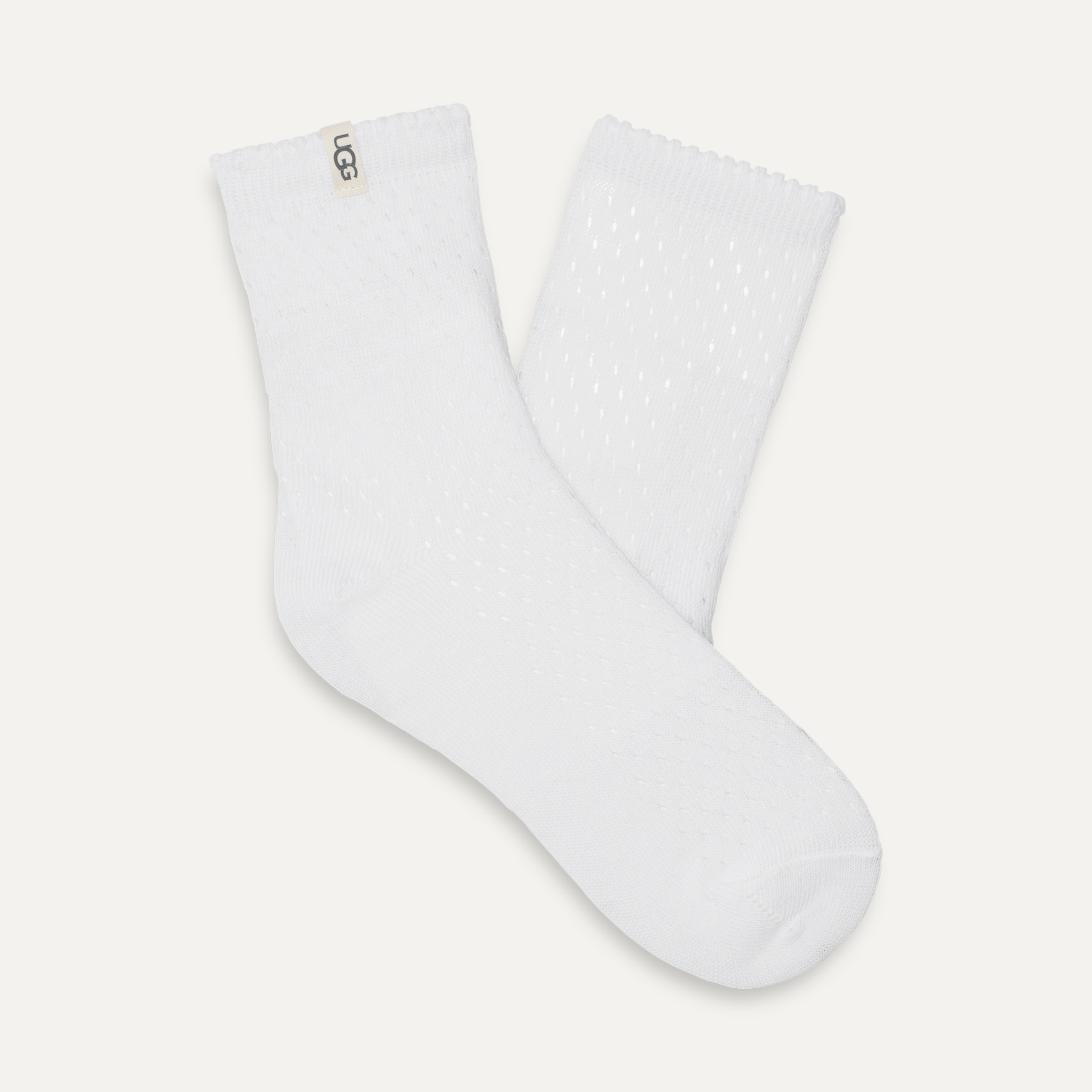 A pair of white quarter socks with a visible logo on the heel. Available at Be Charmed