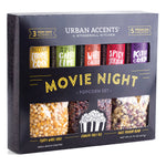 Box of Urban Accents Movie Night Popcorn Set with various popcorn flavors on a white background. Available at Be Charmed