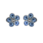 A pair of Wheeler sterling silver earrings with blue sapphire flowers and clear crystals. Available at Be Charmed