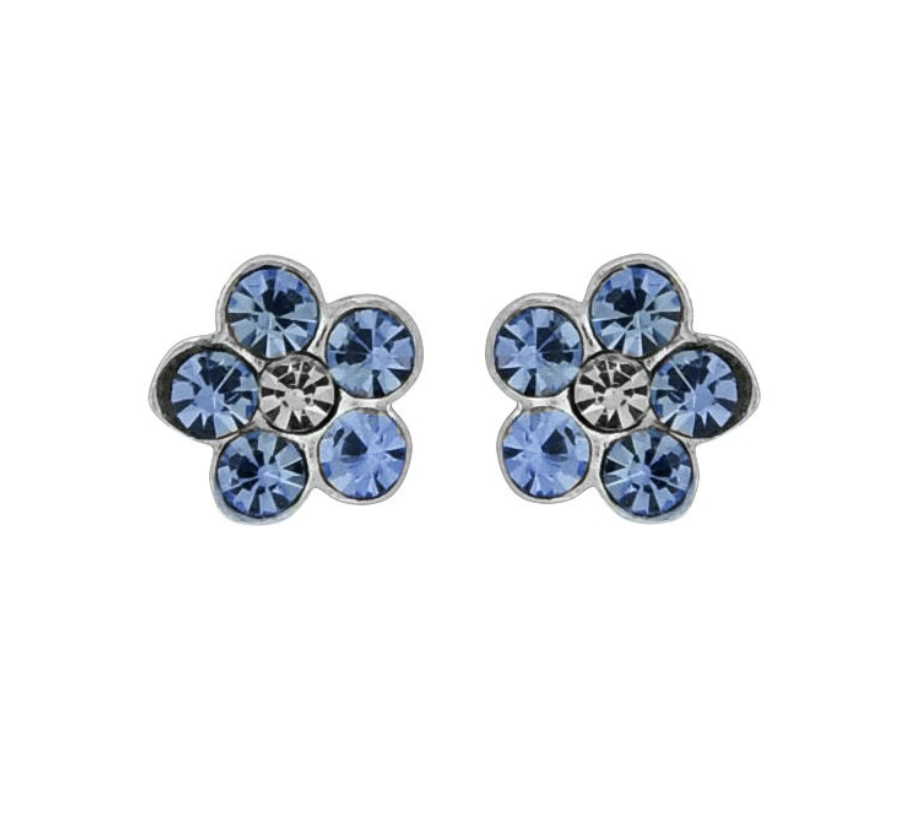 A pair of Wheeler sterling silver earrings with blue sapphire flowers and clear crystals. Available at Be Charmed